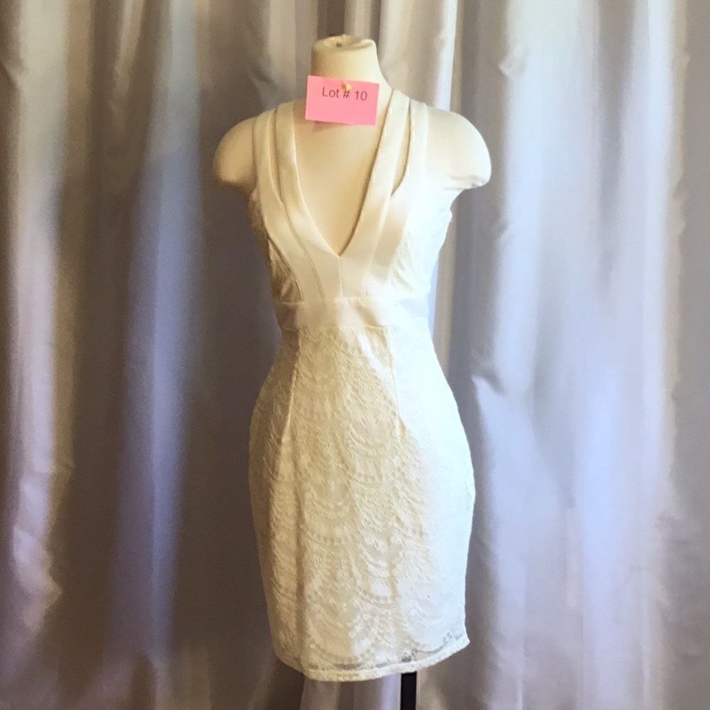 Sleeveless lace dress in size small by CHARLOTTE RUSSE